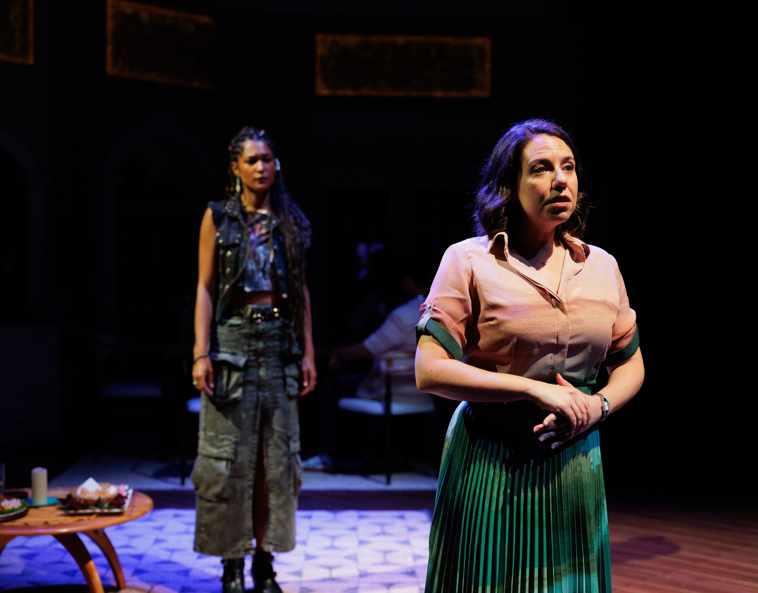 Ashley Alvarez as “Eugenia Silva” (front) and Caro Guzmán as “Mercedes Silva” in La Jolla Playhouse’s world premiere of DERECHO, by Noelle Viñas, directed by Delicia Turner Sonnenberg; photo by Rich Soublet II.