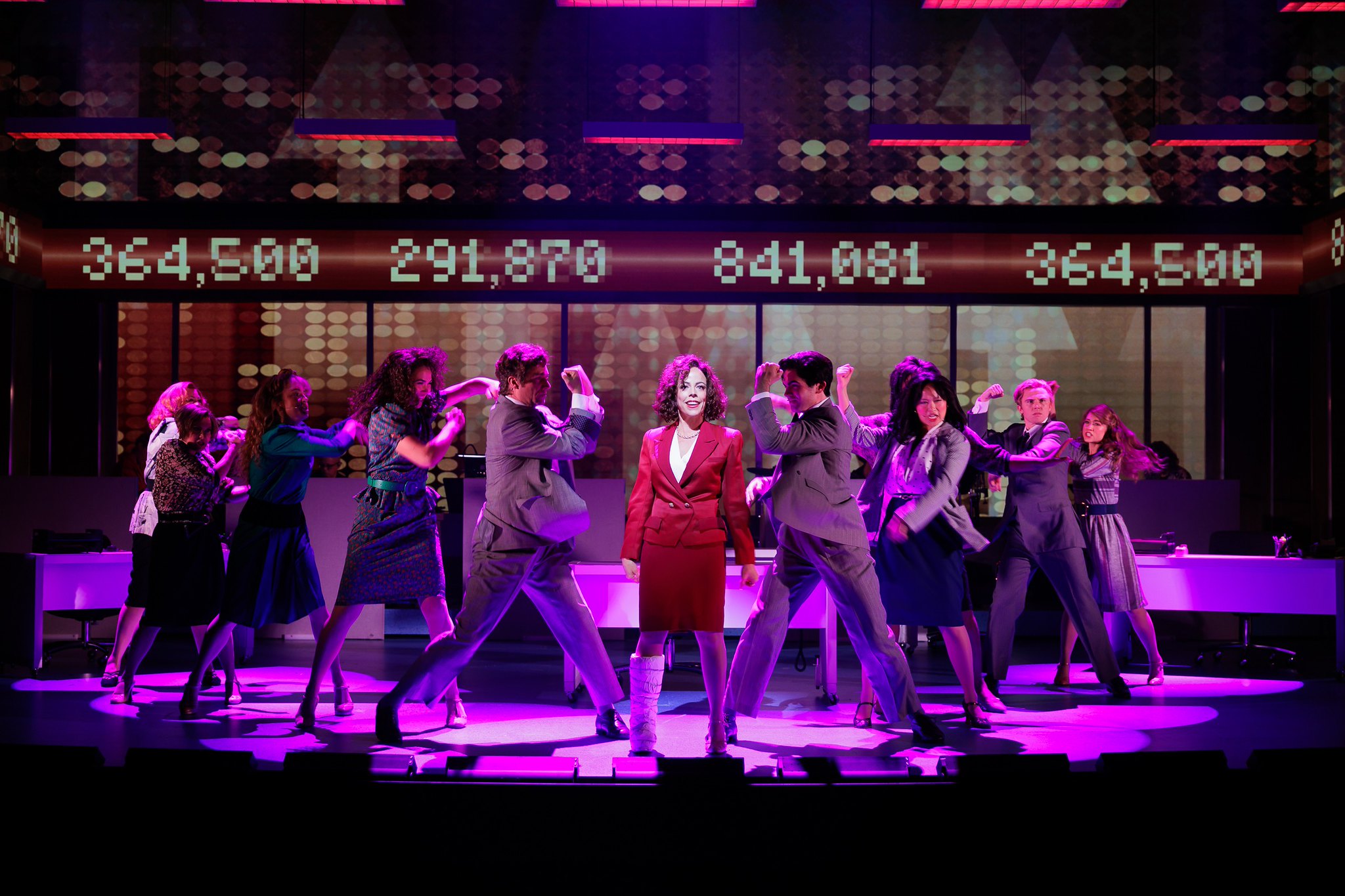 Leslie Rodriguez Kritzer (center) with cast members in WORKING GIRL; photo by Rich Soublet II.