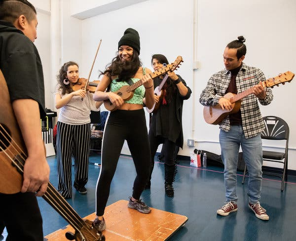 From left: The cast members Frances Ines Rodriguez, Tania Mesa, Silvia Dionicio, Jen Anaya, and Andres Quintero practice the song “El Siquisirí” as they rehearse “Fandango for Butterflies (and Coyotes).” Credit: Krisanne Johnson for The New York Times